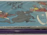 three children ' s books sitting on top of each other on a table