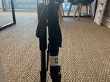 a camera that is sitting on a tripod in a room