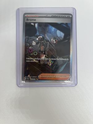 a close up of a card in a plastic case on a table