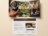 a folded brochure with photos of people having a meal in a restaurant