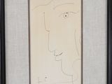 an image of a drawing of a man ' s face in a black frame