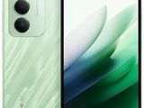 a green and white smartphone with a camera on top of it
