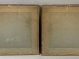 pair of antique wooden picture frames with glass inserts