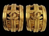 two pairs of gold toned chanel hoop earrings