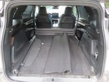 a trunk of a car with the doors open