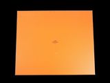 an orange square box with a black background and a small white dot on the bottom