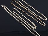 a pearl and diamond necklace and earring set