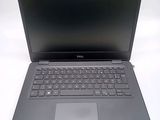 the dell laptop is open and ready to be used
