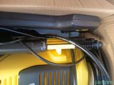 a box with a bunch of wires and a laptop in it