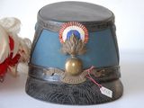 a blue hat with a red, white, and blue design on it