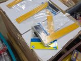 a box full of tools and supplies sitting on the floor