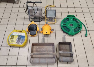 a lot of tools that are on the floor