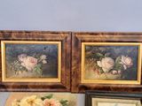 two framed pictures of flowers on a table with a picture of a bird