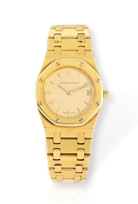 une montre-bracelet pour femme en or jaune 18 carats, avec une lunette sertie de diamants