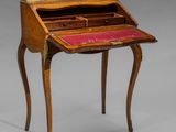 a small writing desk with a drawer on one side and a drawer on the other