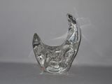 a clear glass vase with a silver design on it
