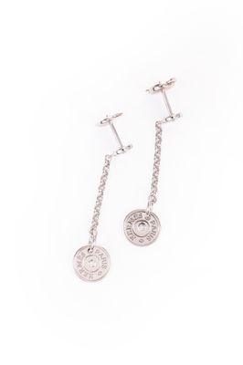 a pair of earrings with a coin on a chain