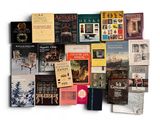 a lot of books that are sitting on a table