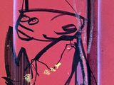 a sticker on the side of a red wall with a drawing of a cat