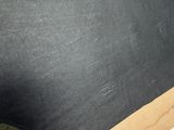 a blackboard with a drawing of a road on it