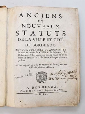 an open book with a picture of a man riding on a horse