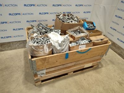 many boxes of screws and bolts on a pallet