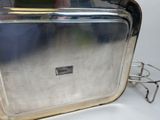 a silver tray that is sitting on a table