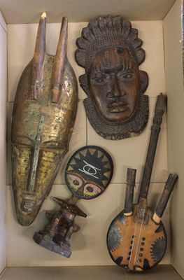 a box with a variety of decorative items in it