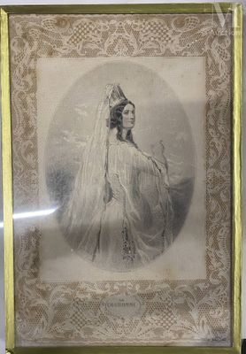 an old picture of a woman in a wedding dress in a gold frame