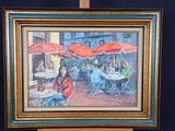 a painting of a group of people sitting at a table under red umbrellas