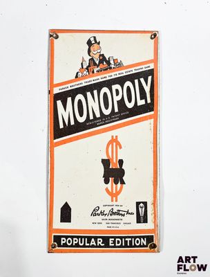 a monopoly sign hanging on the wall of a room