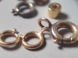 a close up of a bunch of metal rings and rings