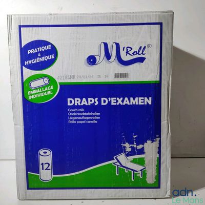 une photo d'une boîte de draps posée sur une table