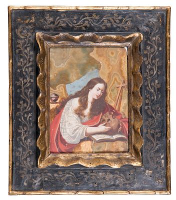 un tableau représentant une femme en train de lire un livre, dans un cadre doré