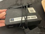 a hand that is holding a video game controller