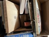 a box full of books sitting on top of a table