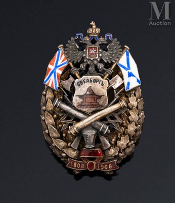 a badge with a coat of arms and two flags on it