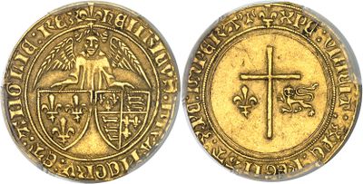 a gold coin with a cross on the front and a cross on the back