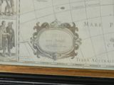 a picture of a map of the world on the wall