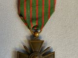 l'image d'une médaille portant une étoile