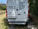 a van that is parked on the side of the road