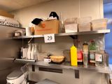 a kitchen with a lot of food on the shelves