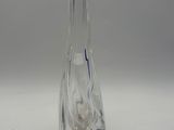 a clear glass vase with a blue stripe on it