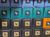 many boxes of cigarettes stacked on top of each other