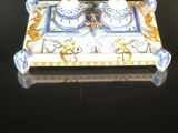 porcelain salt and pepper shaker set on a tray on a table