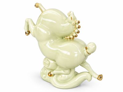 an image of a figurine of a horse with a crown on its head
