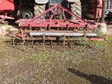 a tractor that is sitting in the dirt