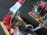 a small machine that is sitting on a pallet