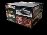 a box of star trek toys on a black background