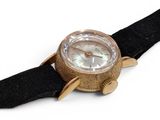 a close up of a watch on a black strap